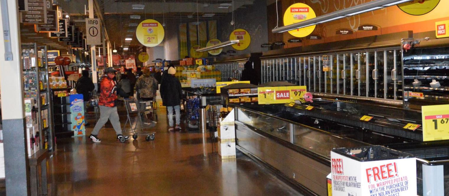 Frantic shoppers empty store shelves